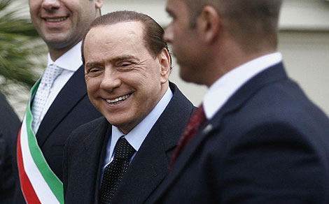 El primer ministro italiano, Silvio Berlusconi, antes del Consejo de Ministros. | AFP