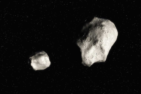 Recreación artística de un asteroide binario. | ESO / L. Calcada.