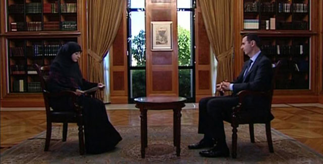 El presidente sirio, Bashar Asad, durante la entrevista ofrecida por la televisión 'Al Manar'. | Afp