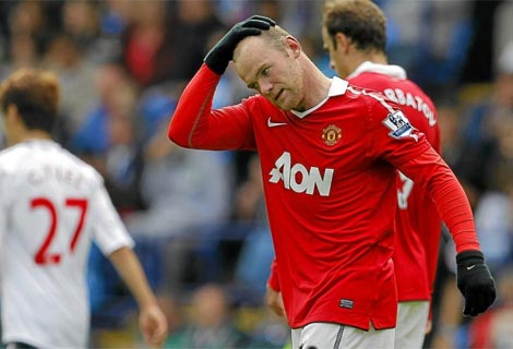 Rooney se lamenta durante el encuentro contra el Bolton. Foto: Reuters Rooney se lamenta durante el encuentro contra el Bolton. Foto: Reuters
